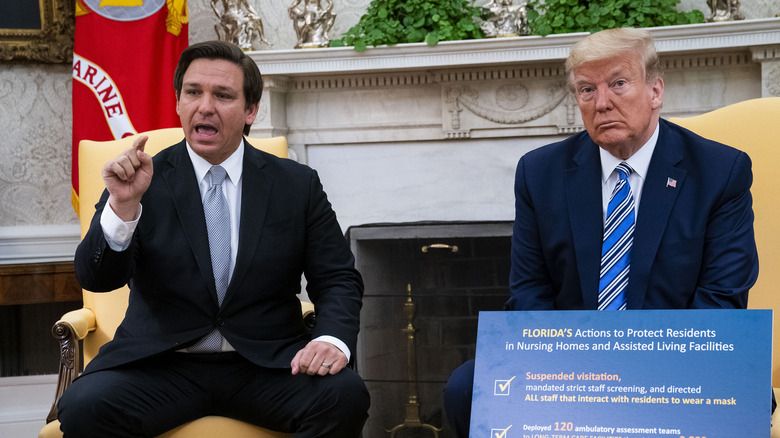 Ron DeSantis and Donald Trump talking