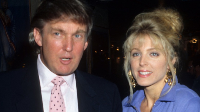 Donald Trump and Marla Maples posing