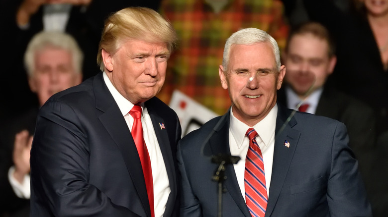 Donald Trump shaking hands with Mike Pence