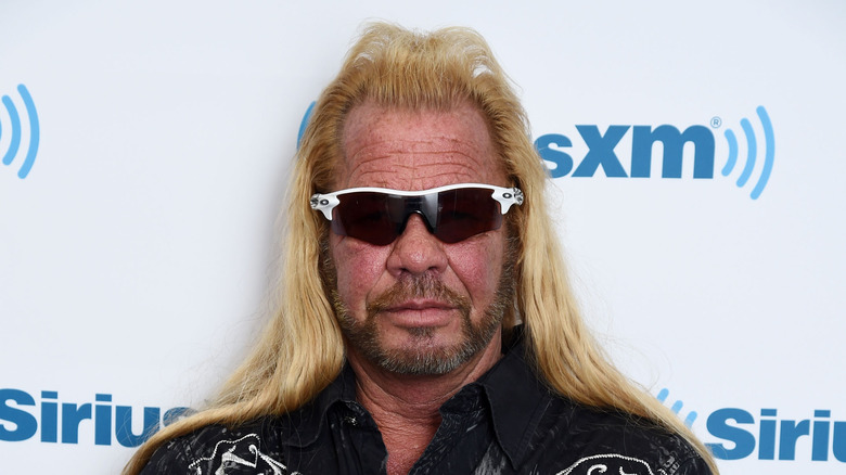 Dog the Bounty Hunter at an event 