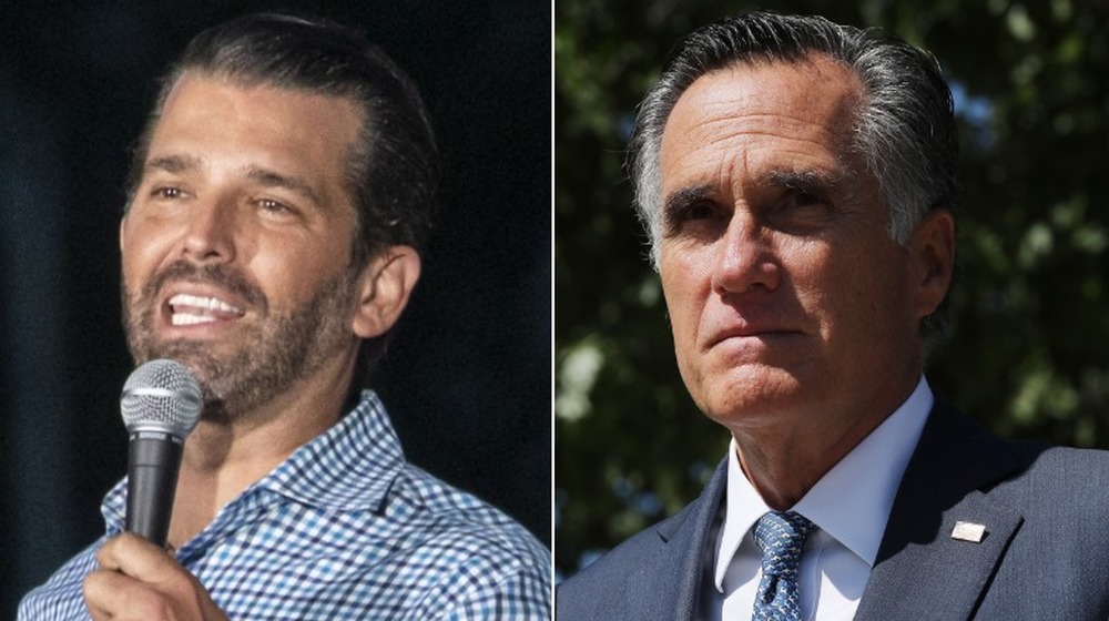 Donald Trump Jr., speaking into a microphone, wearing a checkered shirt; Mitt Romney, looking serious, not smiling, wearing a suit