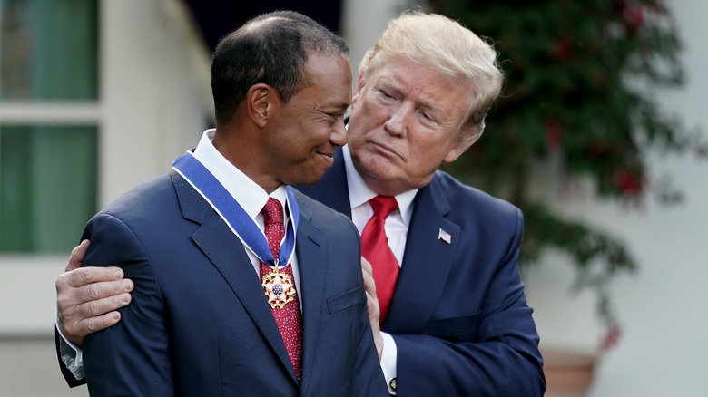 Donald Trump and Tiger Woods at a White House event