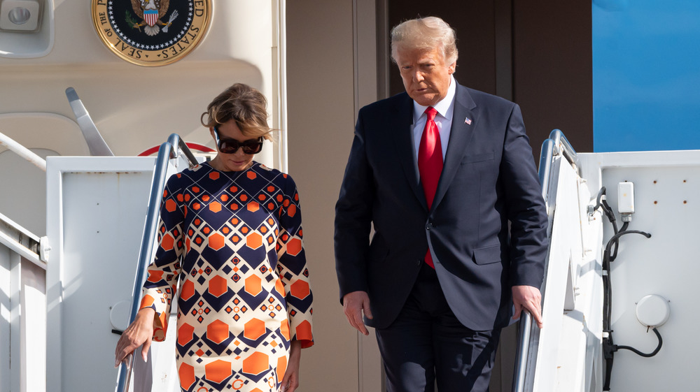 Former first lady Melania Trump & former President Donald Trump arrive in Florida