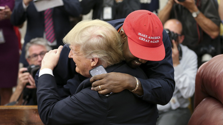 Kanye West hugging Donald Trump