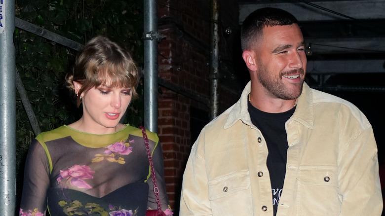 Taylor Swift and Travis Kelce walking