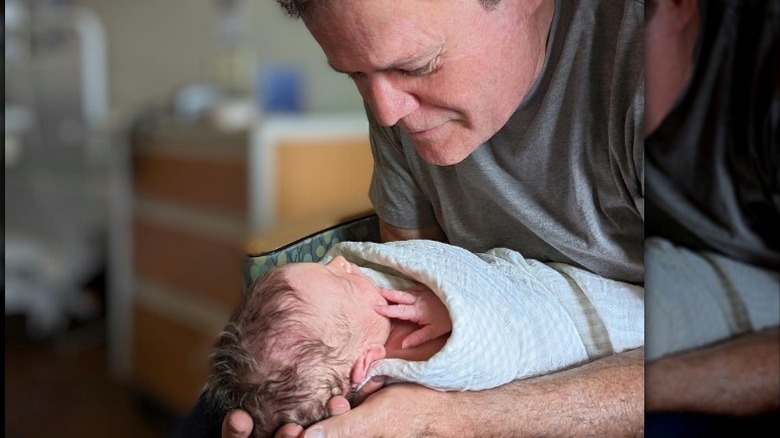 Donny Osmond holding grandson