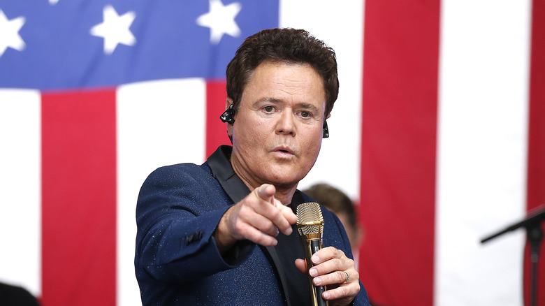 Donny Osmond mircrophone US flag