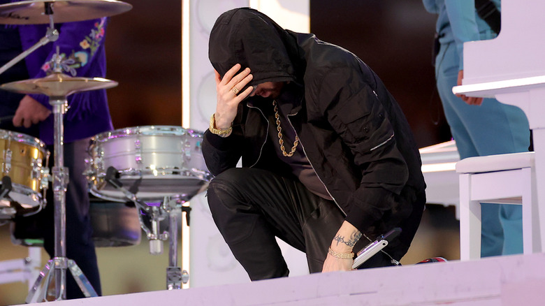 Eminem kneeling