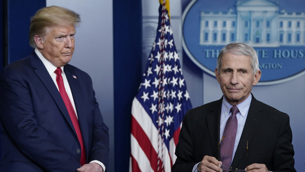 Dr. Anthony Fauci and Donald Trump in a press statement