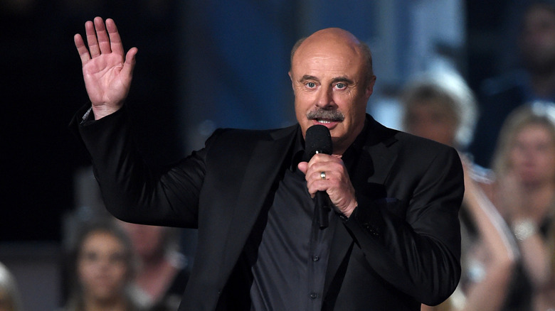 Dr. Phil speaking on stage