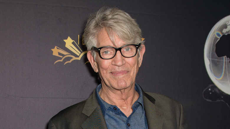 Eric Roberts posing on a red carpet