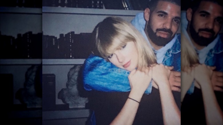 Taylor Swift and Drake posing for photo