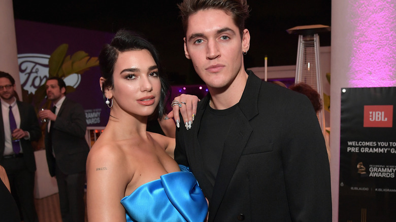 Dua Lipa Isaac Carew posing