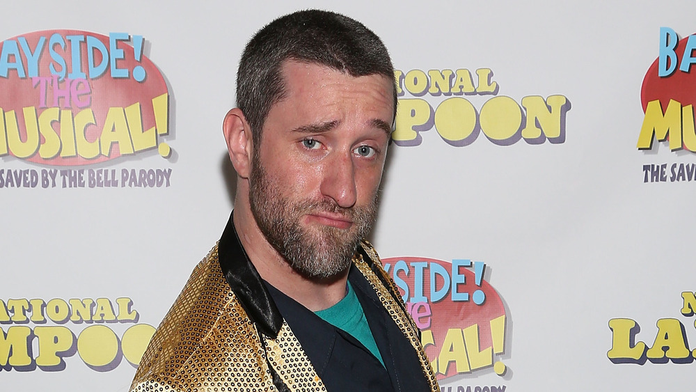 Dustin Diamond posing on red carpet