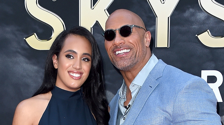 Dwayne Johnson and Simone Johnson posing