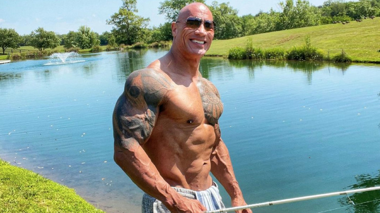 Dwayne Johnson posing shirtless