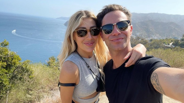 Emma Slater and Sasha Farber take a selfie by the beach