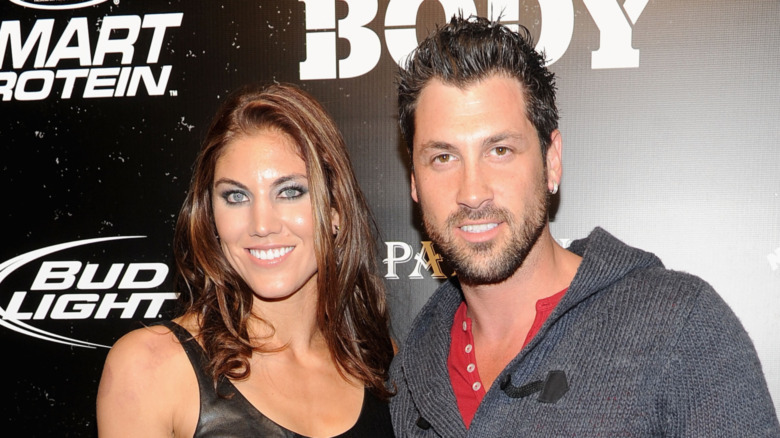 Hope Solo and Maksim Chmerkovskiy at an event