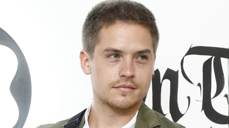 Dylan Sprouse looking to the side