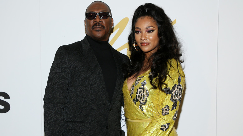 Eddie Murphy posing with Bria Murphy