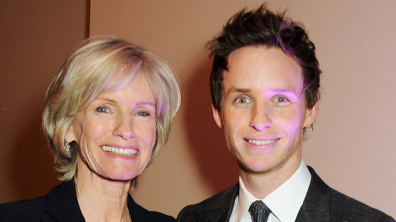 Eddie Redmayne and mom Patricia smile