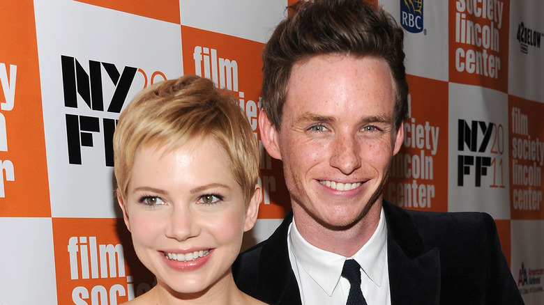 Michelle Williams and Eddie Redmayne smile