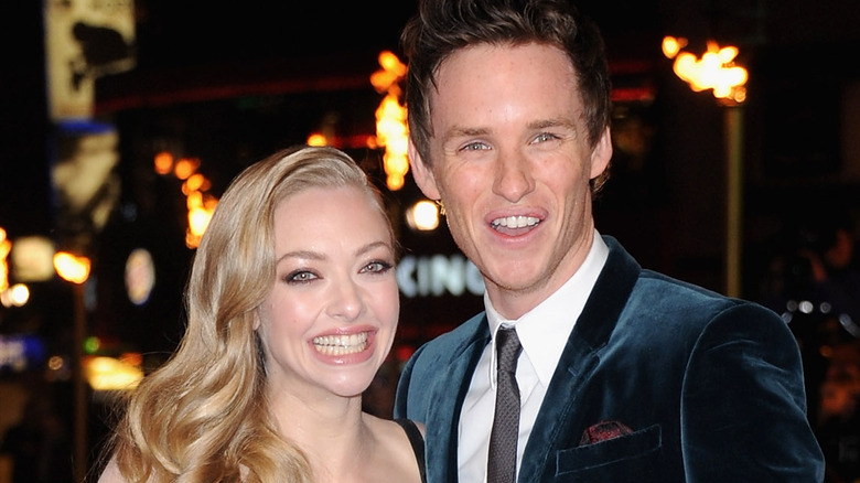 Amanda Seyfried and Eddie Redmayne smile