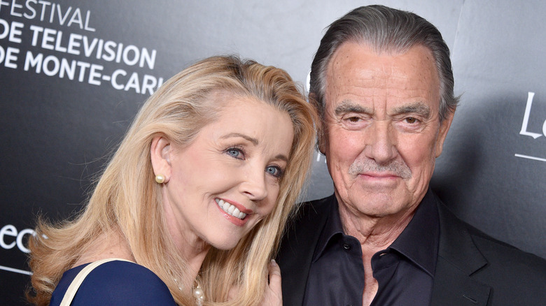 Melody Thomas Scott and Eric Braeden posing