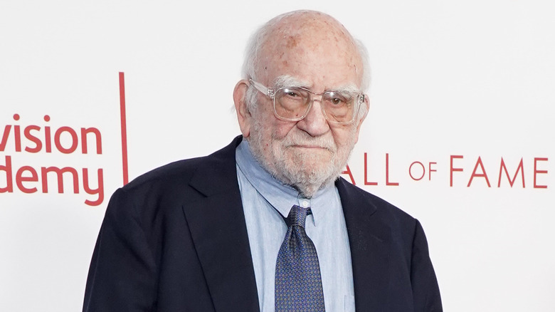 Ed Asner posing at Hall of Fame ceremony