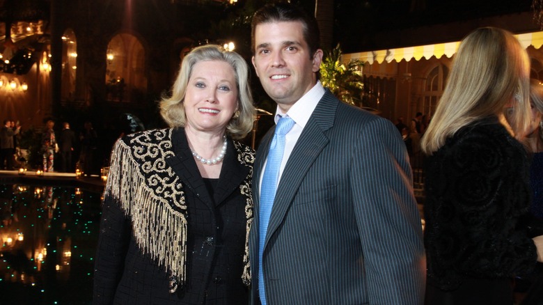 Elizabeth Trump Grau and Donald Trump Jr. smiling in ballroom