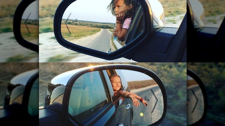 Ella and Emmie Gaines riding in a car