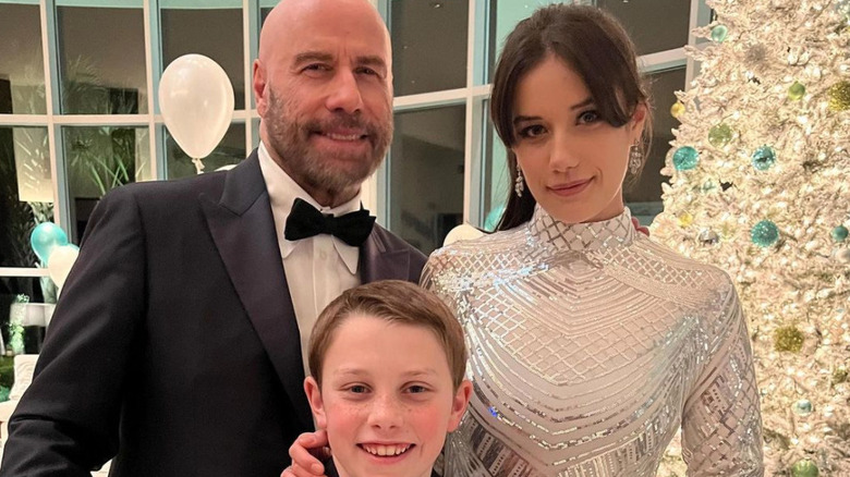 John Travolta poses with Ella and Benjamin Travolta