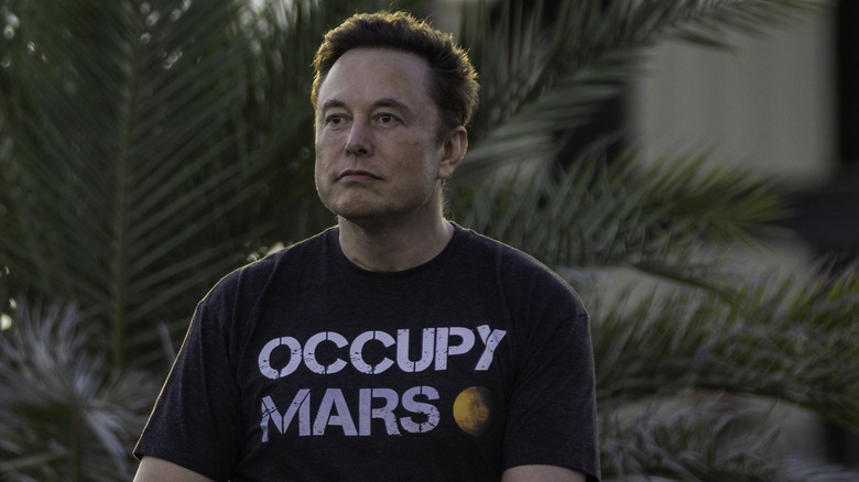 Elon Musk in 'Occupy Mars' shirt