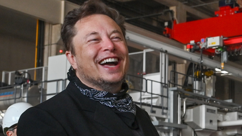 Tesla CEO Elon Musk laughing