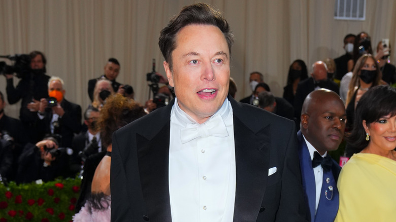 Elon Musk wears a white bow-tie