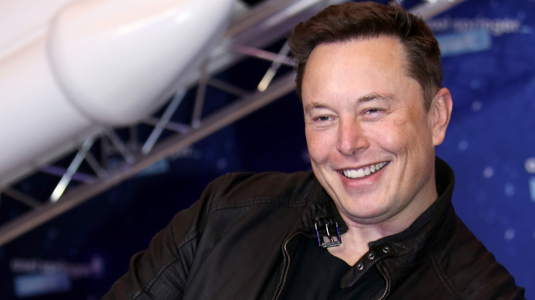 Elon Musk laughing 