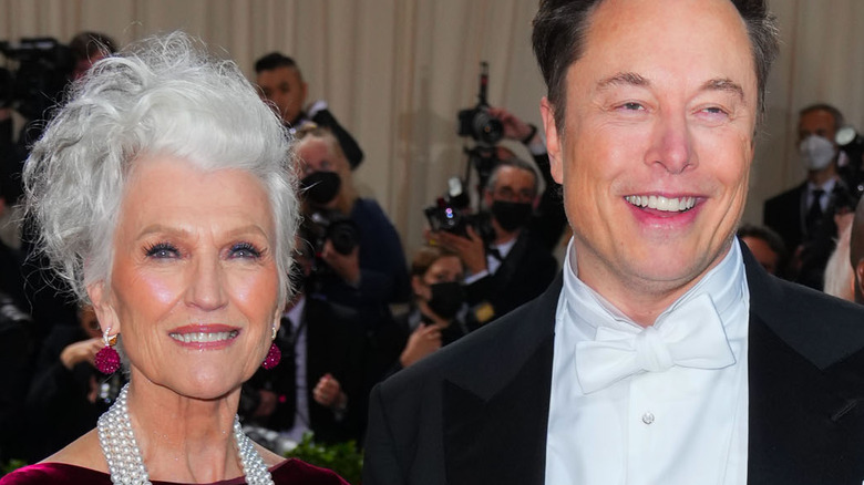 Maye Musk and Elon Musk at an event 