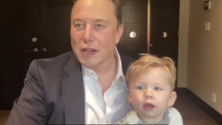 Elon Musk and Baby X smiling