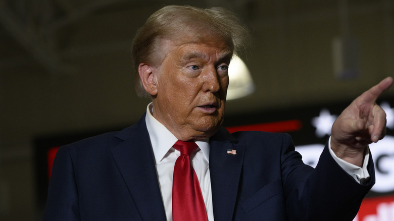 Donald Trump pointing to someone while at a rally.