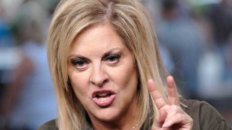 Nancy Grace holding up two fingers