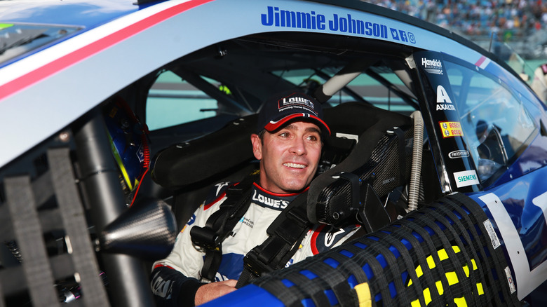 Jimmie Johnson smiling inside car