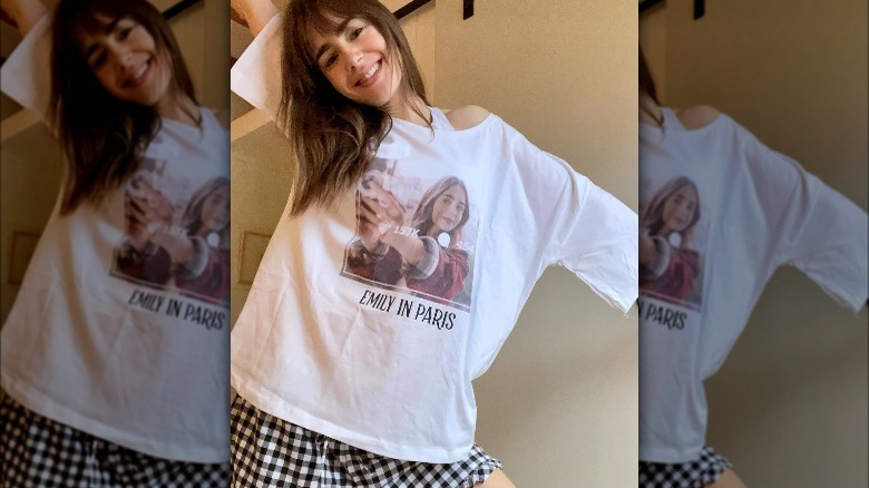 Lily Colins wearing Emily In Paris merchandise