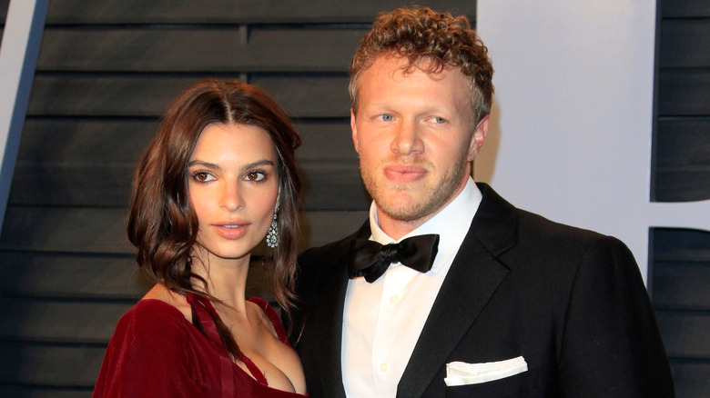 Emily Ratajkowski posing with Sebastian Bear-McClard