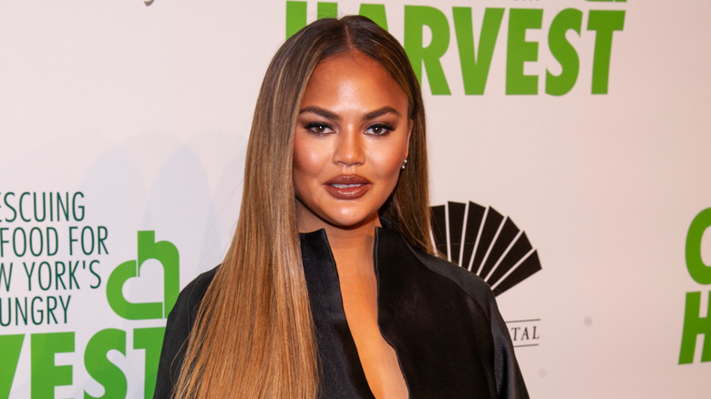 Chrissy Teigen wearing Azzi & Osta attending the 2019 City Harvest Gala