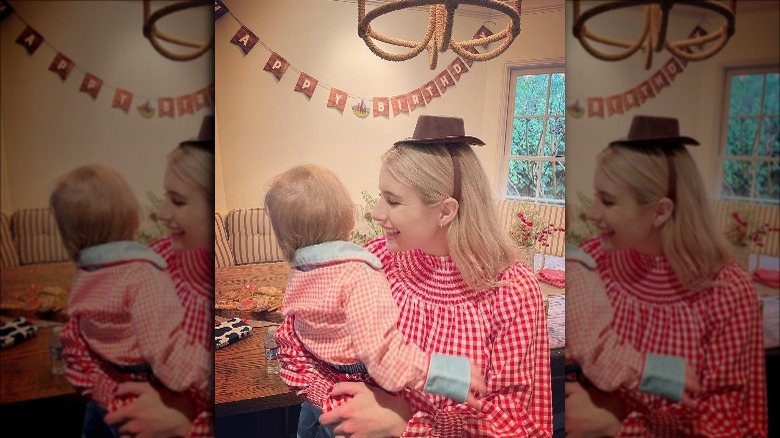 Emma Roberts holding son Rhodes on his birthday