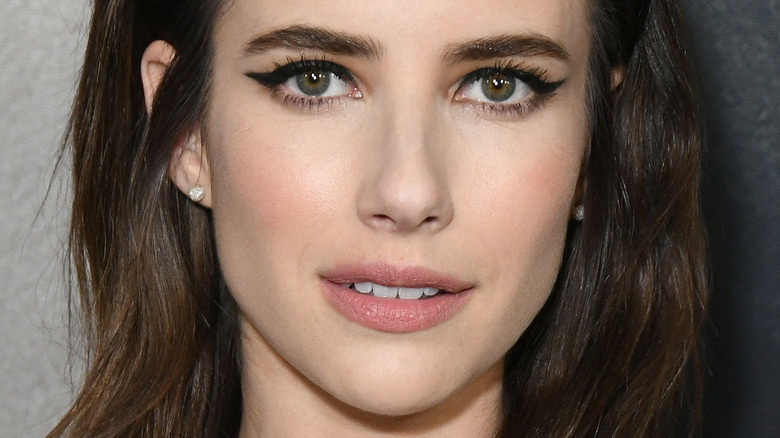 Emma Roberts poses with cat-eye makeup