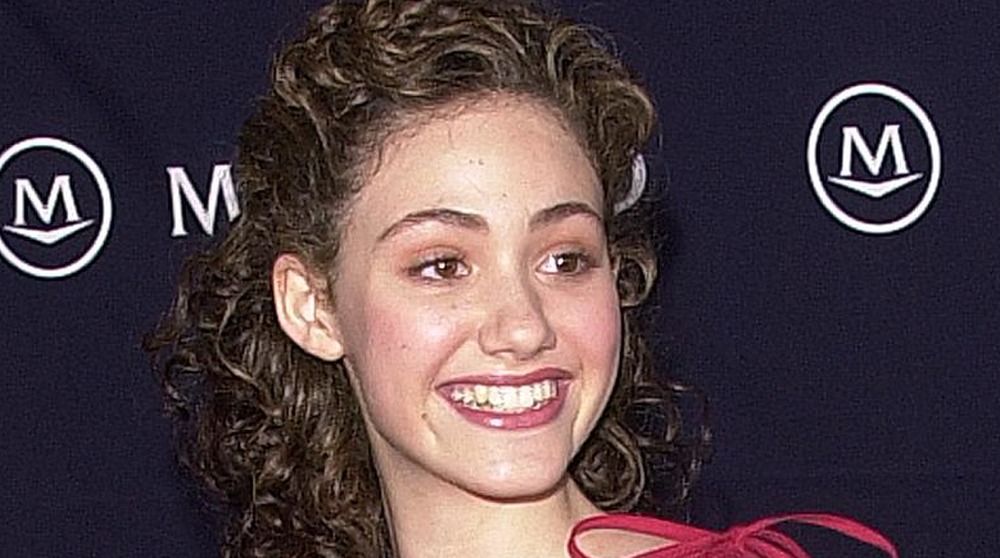 Emmy Rossum grinning in 2005