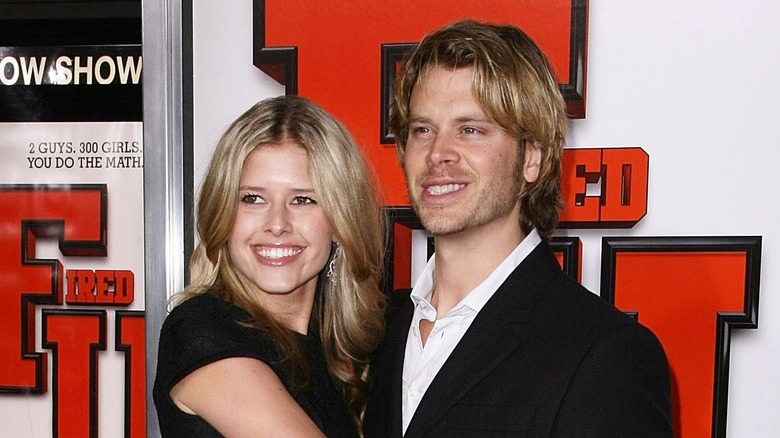 Sarah Wright and Eric Christian Olsen smiling together