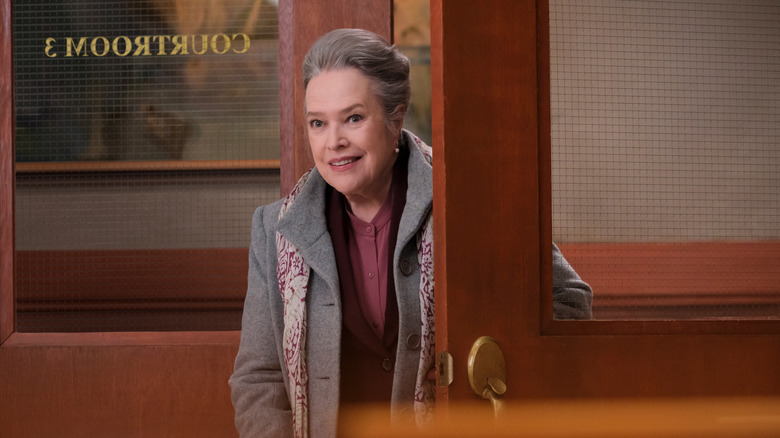 Kathy Bates walking through door in publicity still for Matlock