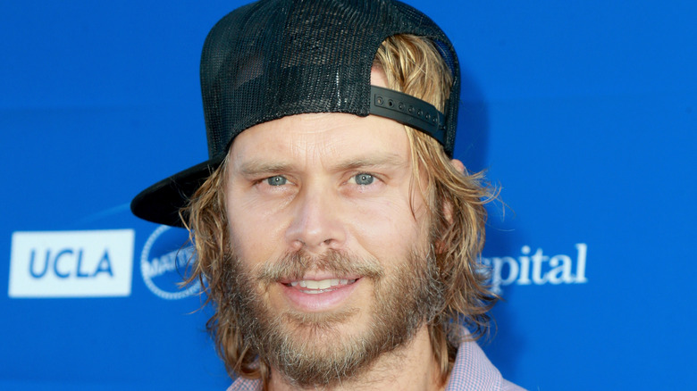 Eric Christian Olsen wearing a hat